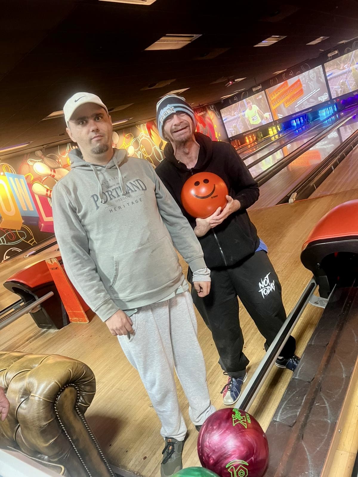 Participants at the bowling alley having fun