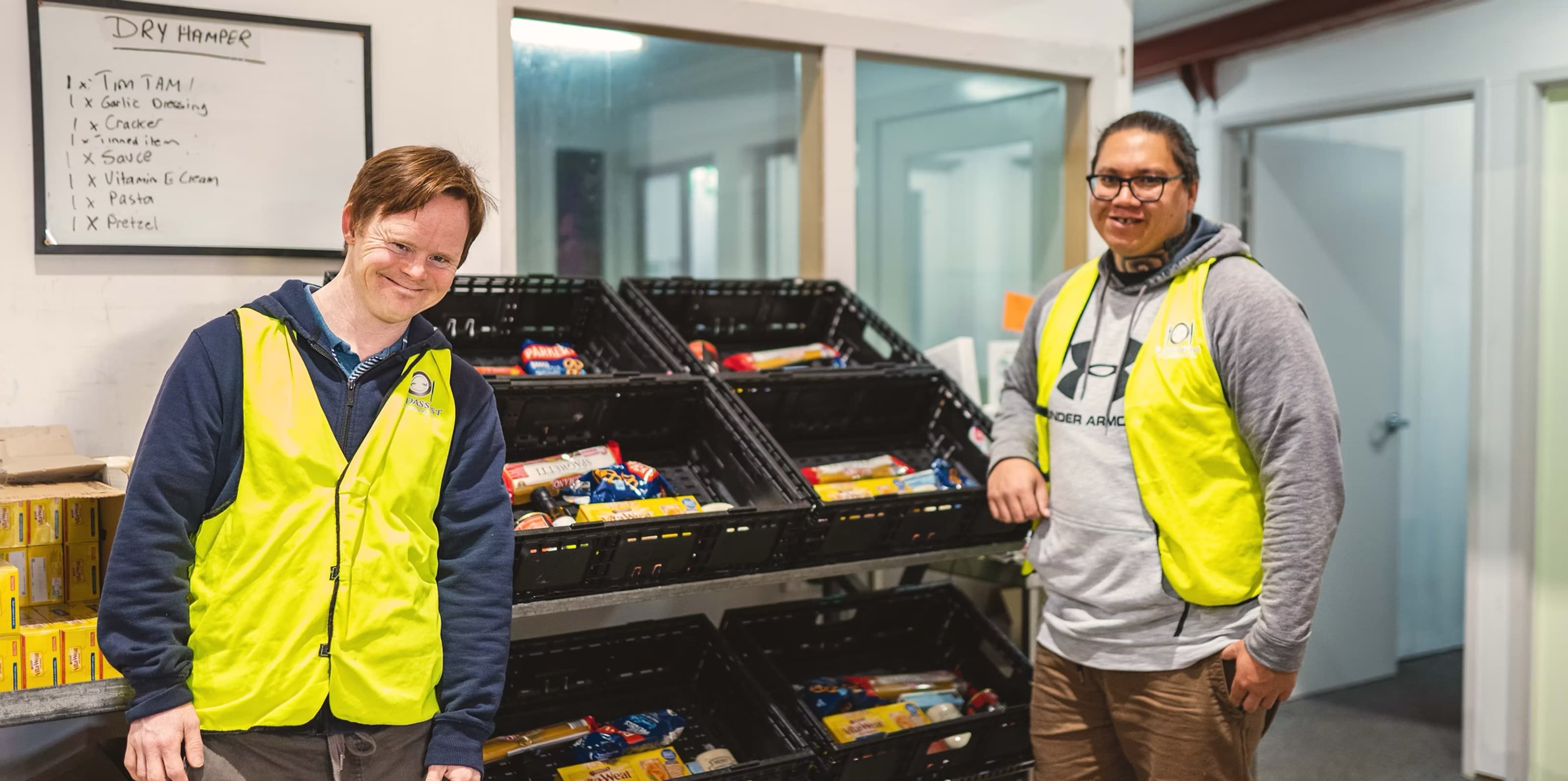 Food Assist volunteers sorting food at the warehouse